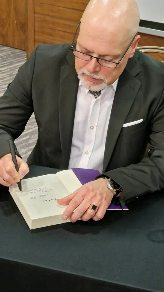 Luty 2024 r. spotkanie autorskie z pisarzem Markiem Krajewskim, zdjęcie 4